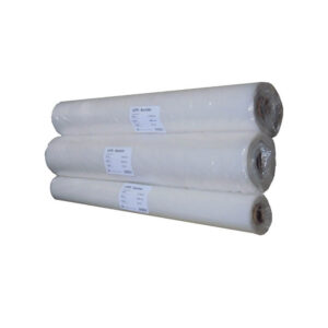 Three large white LDPE film rolls wrapped in plastic, stacked in a row with visible labels on each roll