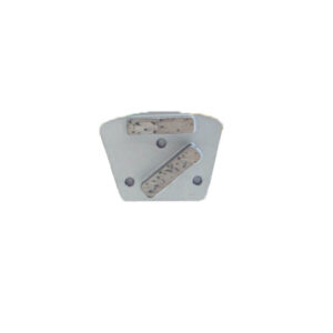 Small gray metal mounting plate with two rectangular cork pads attached diagonally and horizontally, plus three rivets.