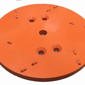 Orange circular mounting plate with several holes (three inner, multiple around edge) and small hooks along the rim