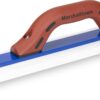 Grout float for smoothing tile grout, blue edge on a white base with a brown ergonomic handle labeled Marshalltown