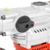 Close-up of a silver power tool body with a black adjustment knob and red accents, showing a screw and circular dial detail.
