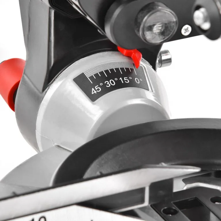 Close-up of a motorcycle throttle with a silver dial marked 0°–45°, and a red safety lever nearby.