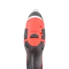Cordless drill viewed from above, red body with black grip and clenched trigger area labeled 'PRESS'