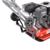 Close-up of a gas-powered tiller engine with a red frame and black protective guard.