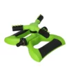 Green lawn sprinkler with four black spray arms arranged in a star pattern, designed to water a lawn evenly