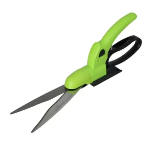 Green-handled kitchen scissors with two long blades and a black finger loop, shown from the side.