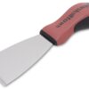 Red and black-handled putty knife with a wide flat metal blade for scraping paint or putty