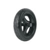 Tire mounted on a black alloy wheel with a visible tread pattern on the side and top edge