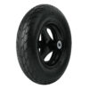 Close-up of a black rubber tire mounted on a glossy black wheel with a silver center hub.