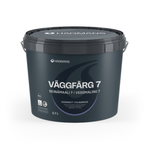 Close-up of a dark gray paint bucket lid displaying the Hagmans logo and the label 'Väggfärg 7'.