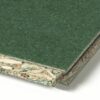 Cross-section of a green artificial turf panel showing the turf surface and OSB core edge view.